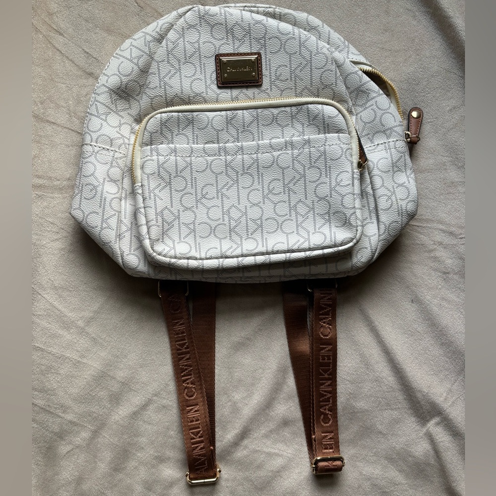 White smaller Calvin Klein book bag purse. New with tags
